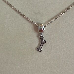 Pandora silver dog bone with crystals charm